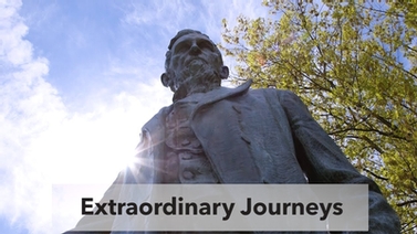 view of the Ezra Cornell statue with the words, 'Extraordinary Journeys'