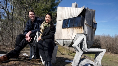 Leslie Lok and Sasa Zivkovic in front of the cabin