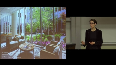 Naomi Sachs presents a photo of a landscaped courtyard at a medical center