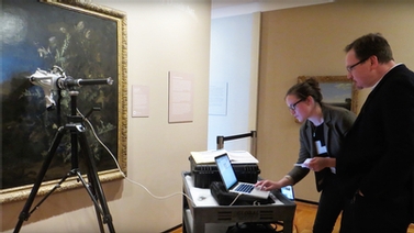 Louisa Smieska conducts x-ray fluorescence analysis of a painting