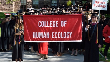 Human Ecology graduates walk in the procession