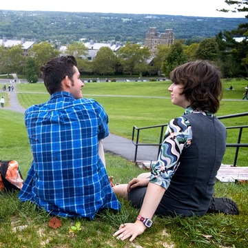 Students sit on libe slope
