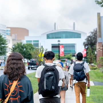 Students walk to class on Cornell's campus