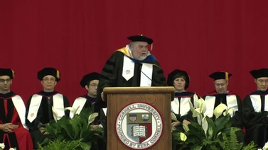 A. speaker at the podium during the ceremony.