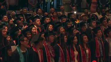 Graduation participants singing.
