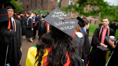 A woman in a decorated graduation cap, 