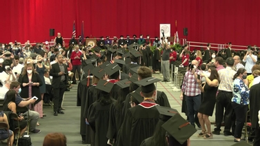 Graduates entering the ceremony location.