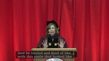 A speaker at the podium.