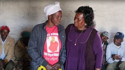 Anne Gighangi with a Kenyan woman attending training